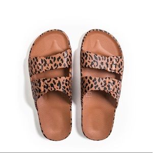 Freedom Moses slide in Leo Toffee